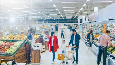 a supemarket with people shopping 