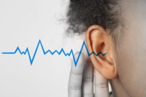 Partial deafness and Tinnitus compensation