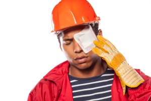 a man with a bandaged eye after suffering an inury 