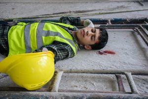 An image of a construction worker who has an head injury. 
