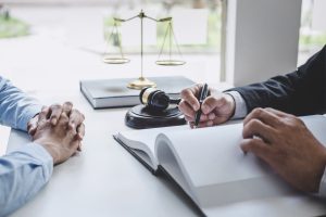 A solicitor calculating a client's loss of earnings as part of their personal injury claim.