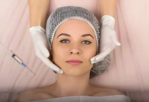 A patient is prepared for cosmetic surgery.