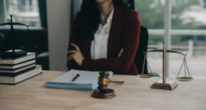A No Win No Fee solicitor works on a claim.