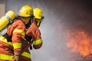 Firefighters put out a fire.