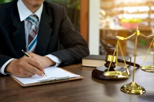 A solicitor works on a sexual abuse claim.