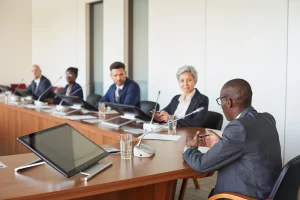 A company's board holding a meeting to discuss data protection strategy