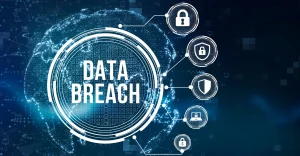 A computerised icon with the words data breach in the middle and shield and padlock icons around the outside